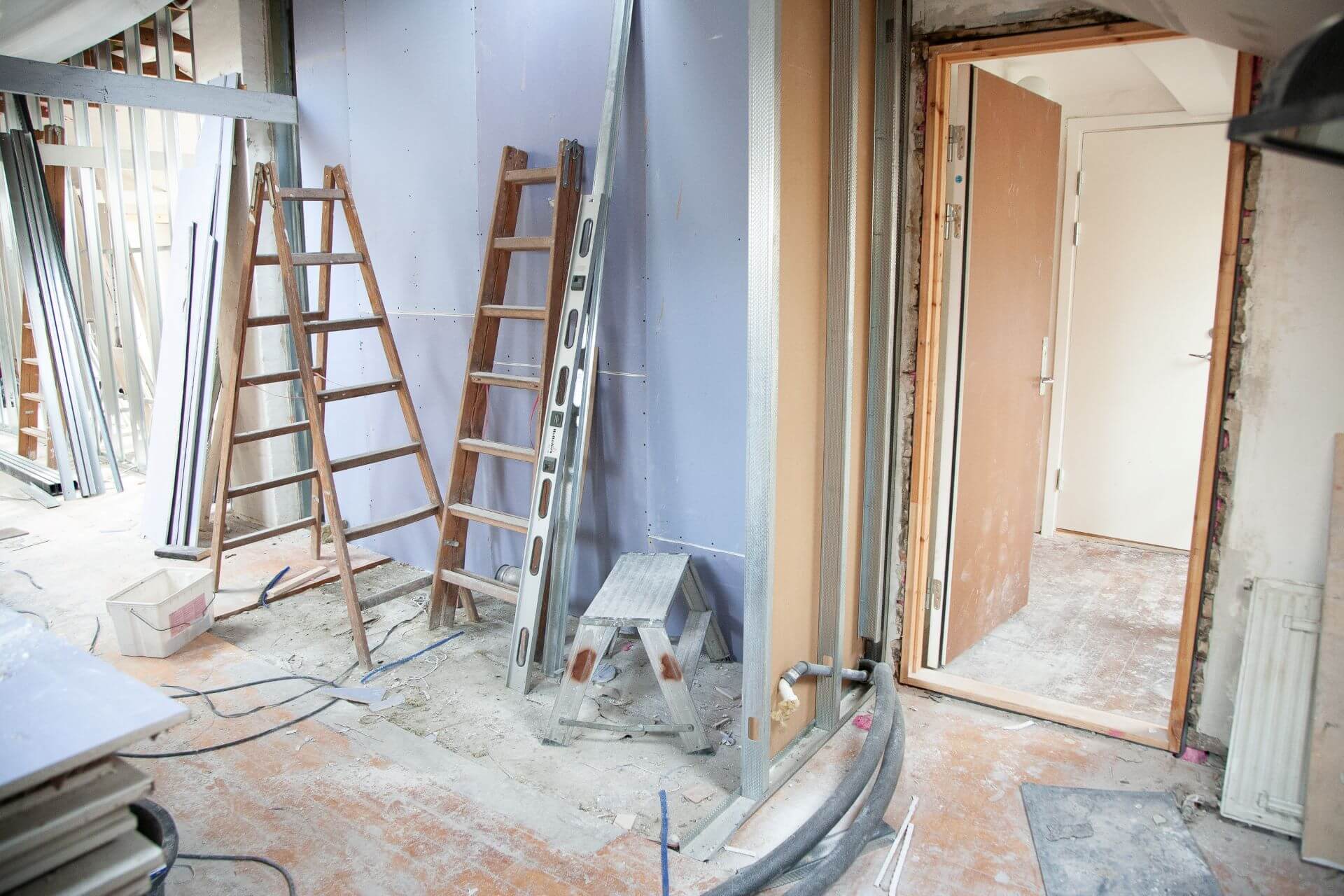 What plumbing and electrical issues do you have to consider when taking on a fixer-upper property?